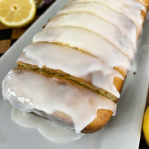 Loaf of lemon bread drizzled with icing