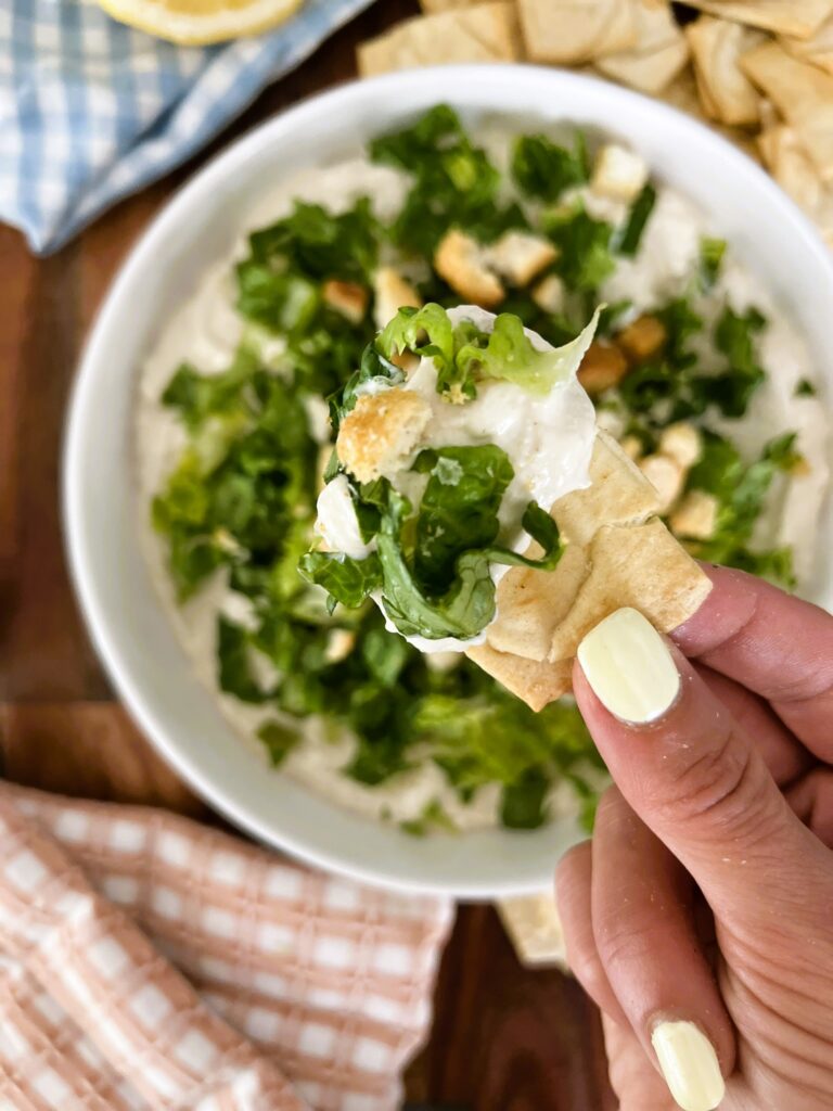 Close-up of Caesar Salad Dip on a chip