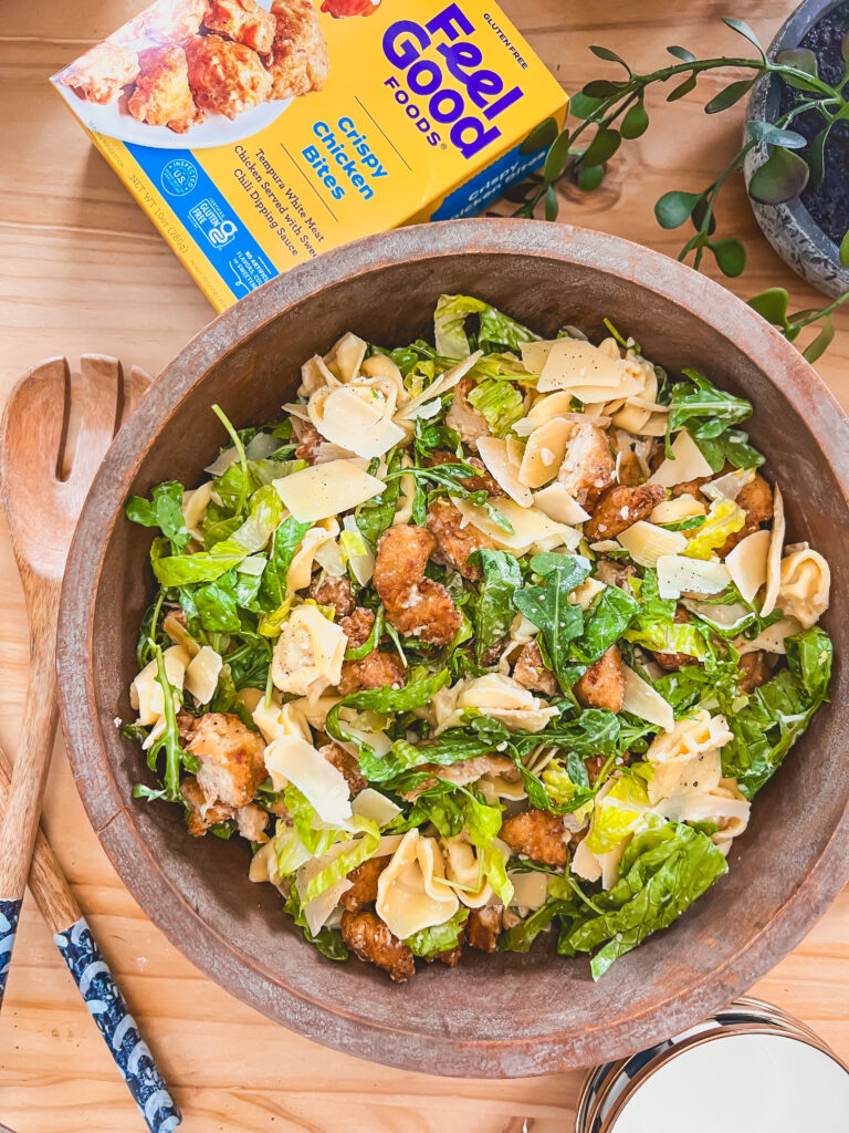 Caesar Tortellini Salad in a wooden bowl