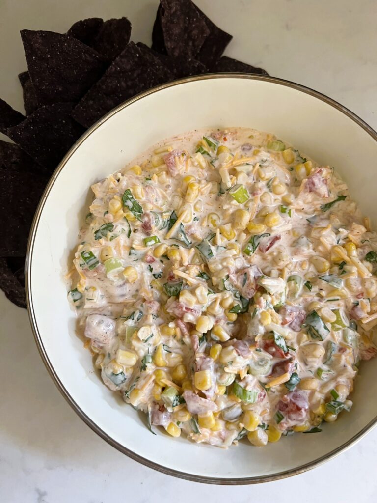 Mexi-Corn Dip with a side of black tortilla chips