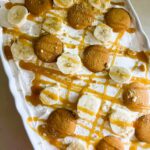 Banana Cheesecake Delight drizzled with caramel sauce