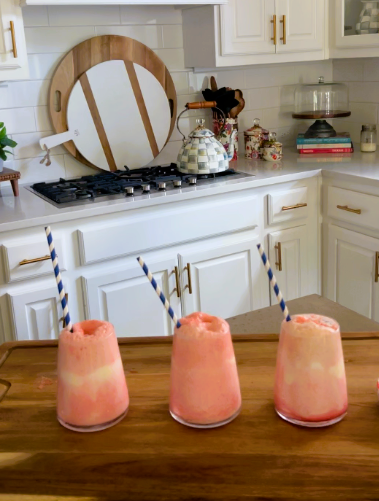 3 Dirty Shirley Floats on a wooden serving board