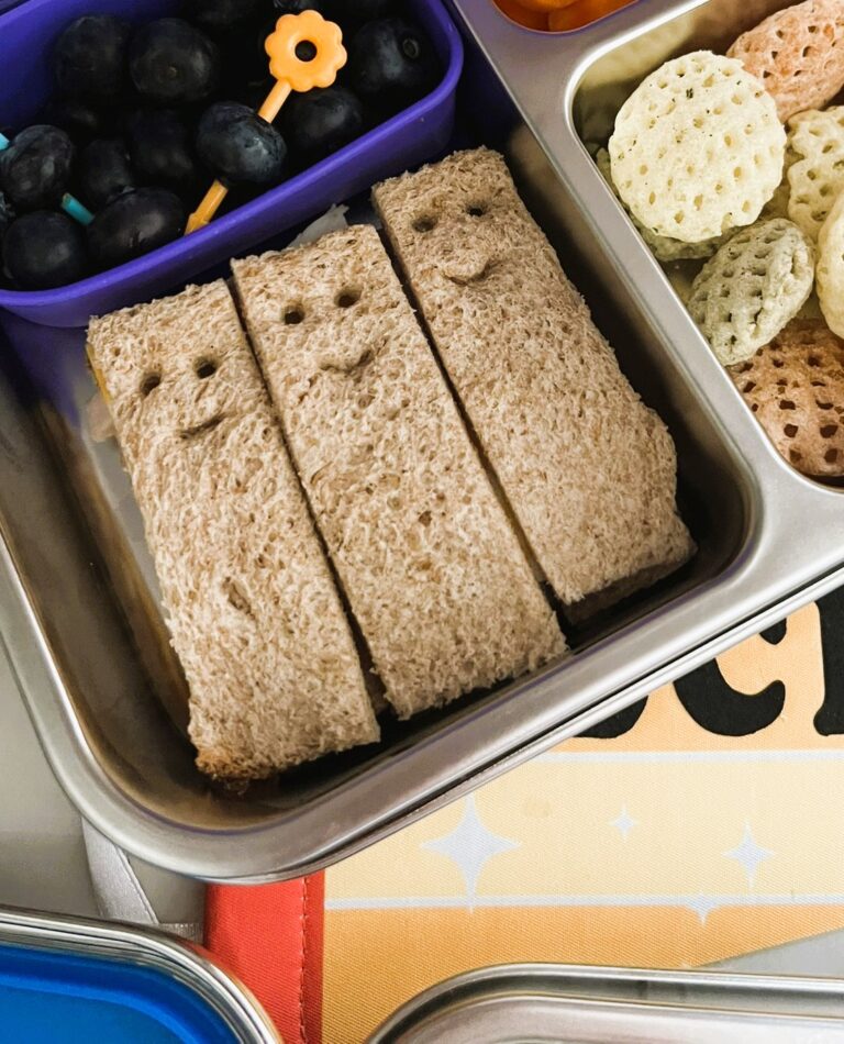 Smiley Face Sandwiches in a metal lunchbox