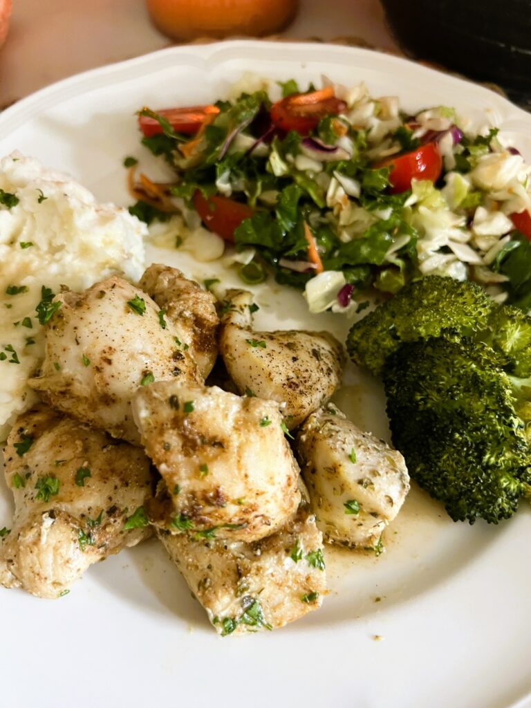 Baked Chicken Bites served with a side of veggies and rice