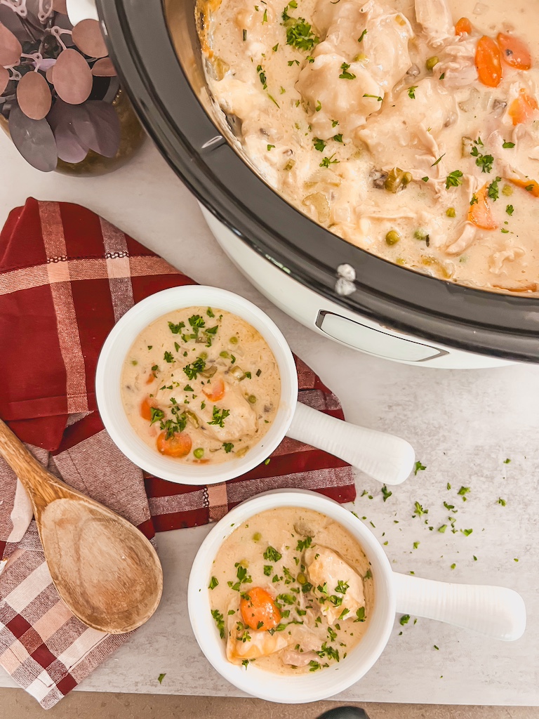 crockpot and bowls full of soup