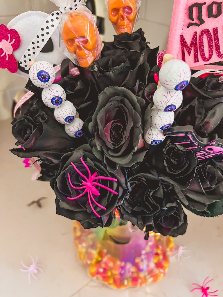close up of black roses as a hallowen floral arrangement