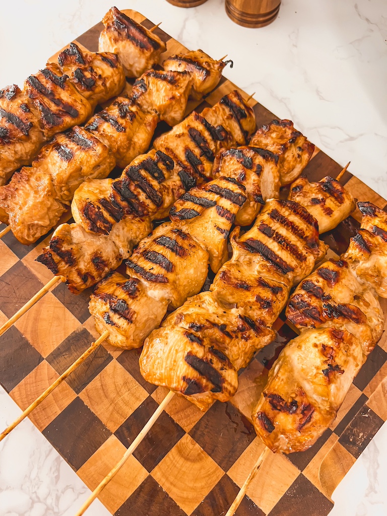 a finished platter of chicken skewers ready for sauce