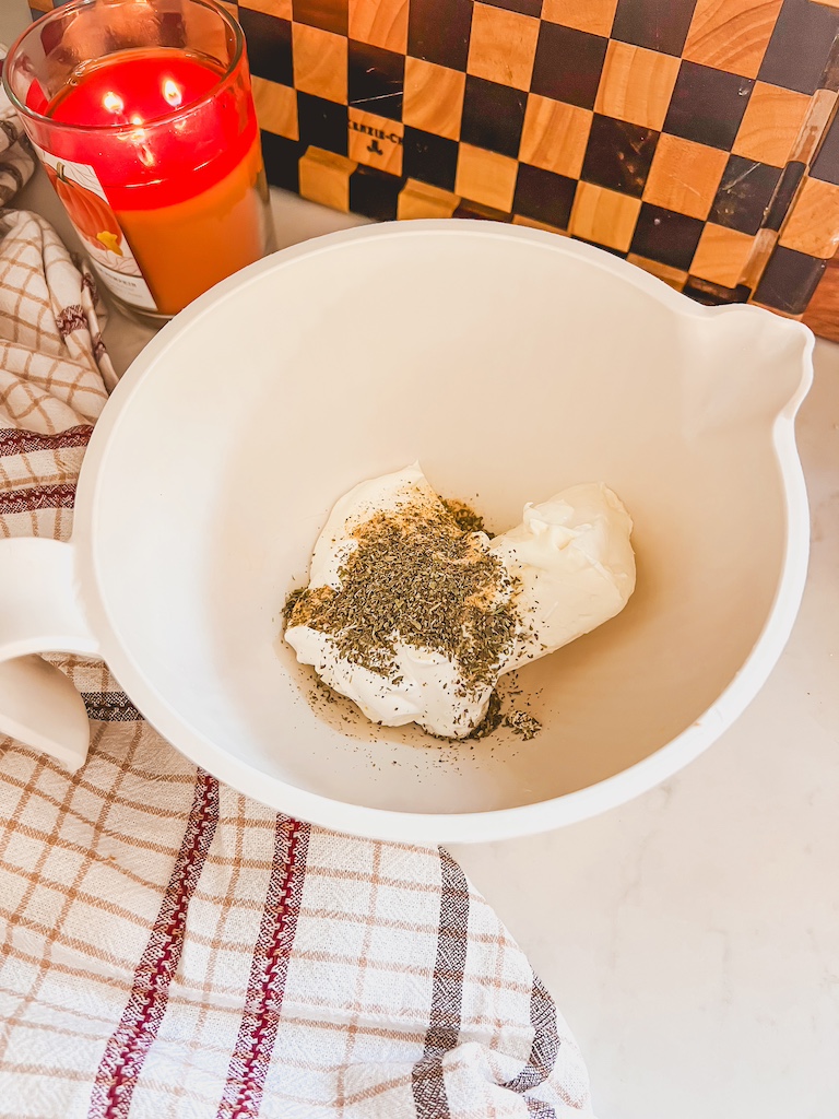 mixing cream cheese base for pizza dip