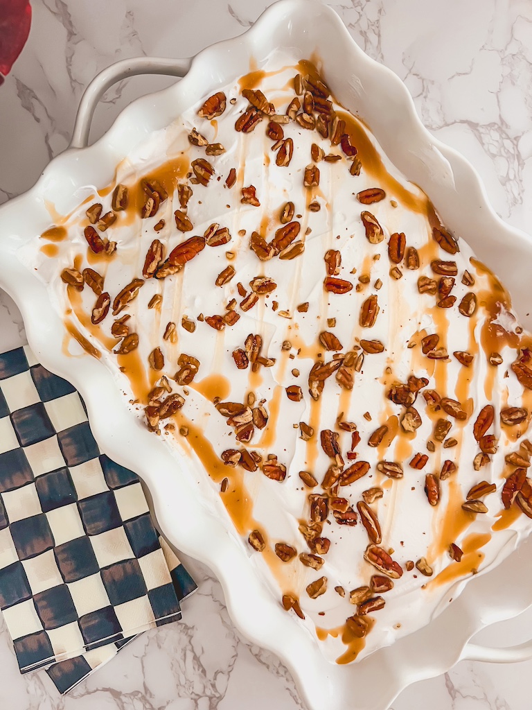 completed pumpkin delight in 9x13 pan, garnished with pecans