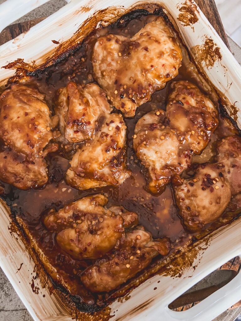 honey garlic chicken thighs In a baking dish right out of the oven