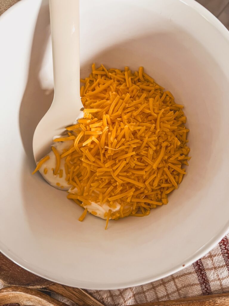 mayo and cheese in white bowl