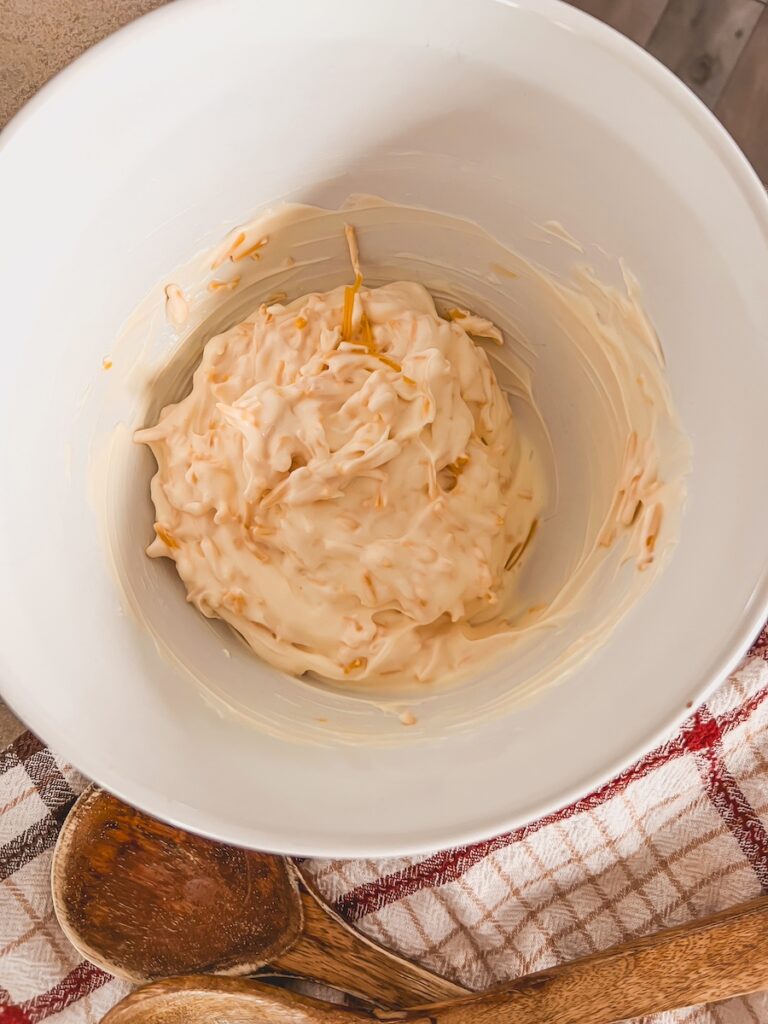 mayo and cheese combined in awhite bowl
