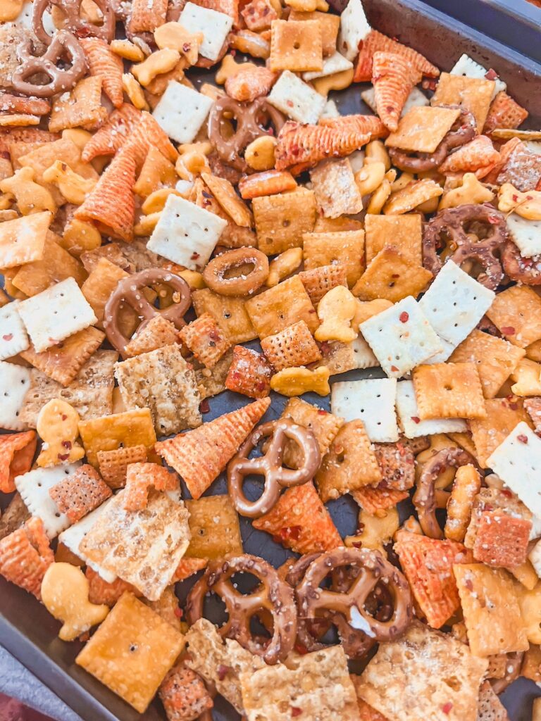 snack mix on baking sheet close up