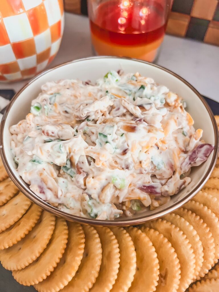 neiman marcus dip in a serving bowl along side crackers