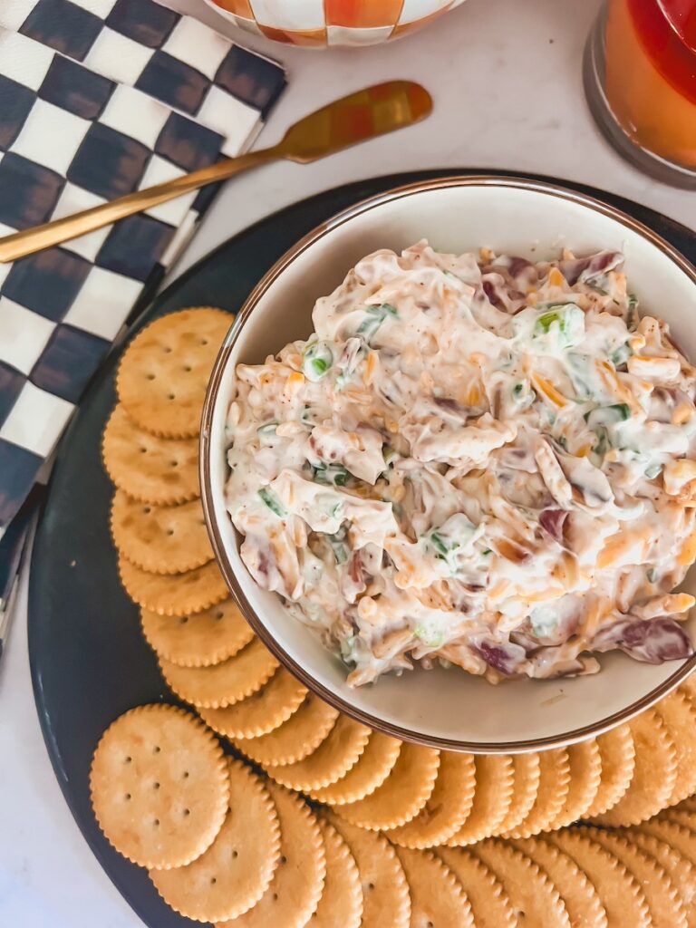 neiman marcus dip with crackers on a serving platter