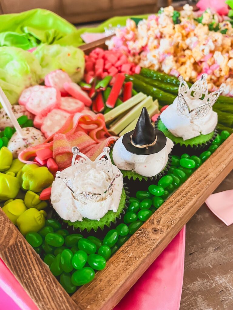 close up view of wicked cupcakes on movie night board