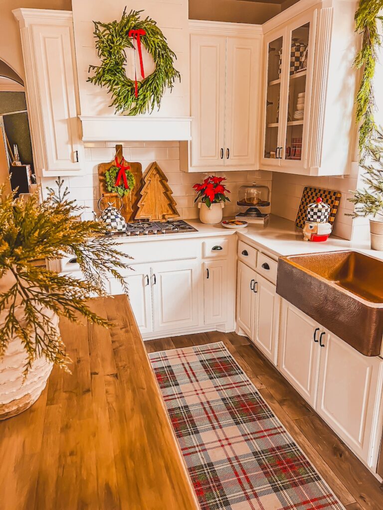 christmas kitchen styled with plaid runner