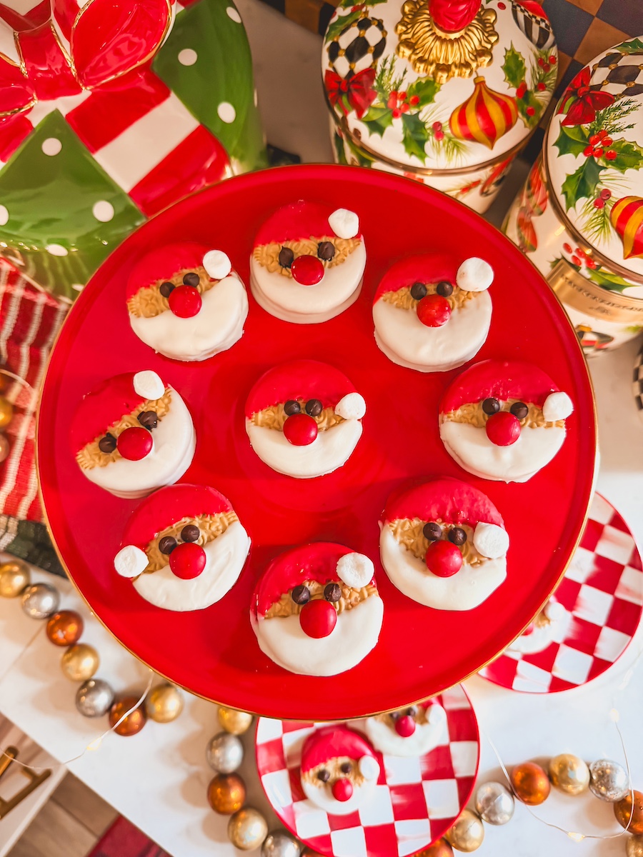 santa oreo cookies on a red cake stand 
