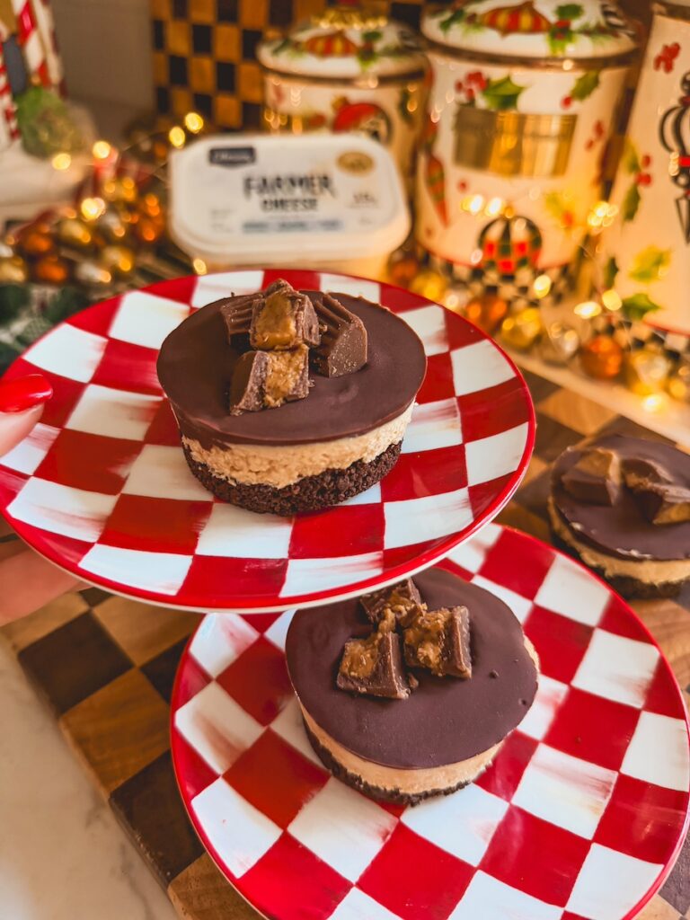 peanut butter cheesecake cup on red and white plate