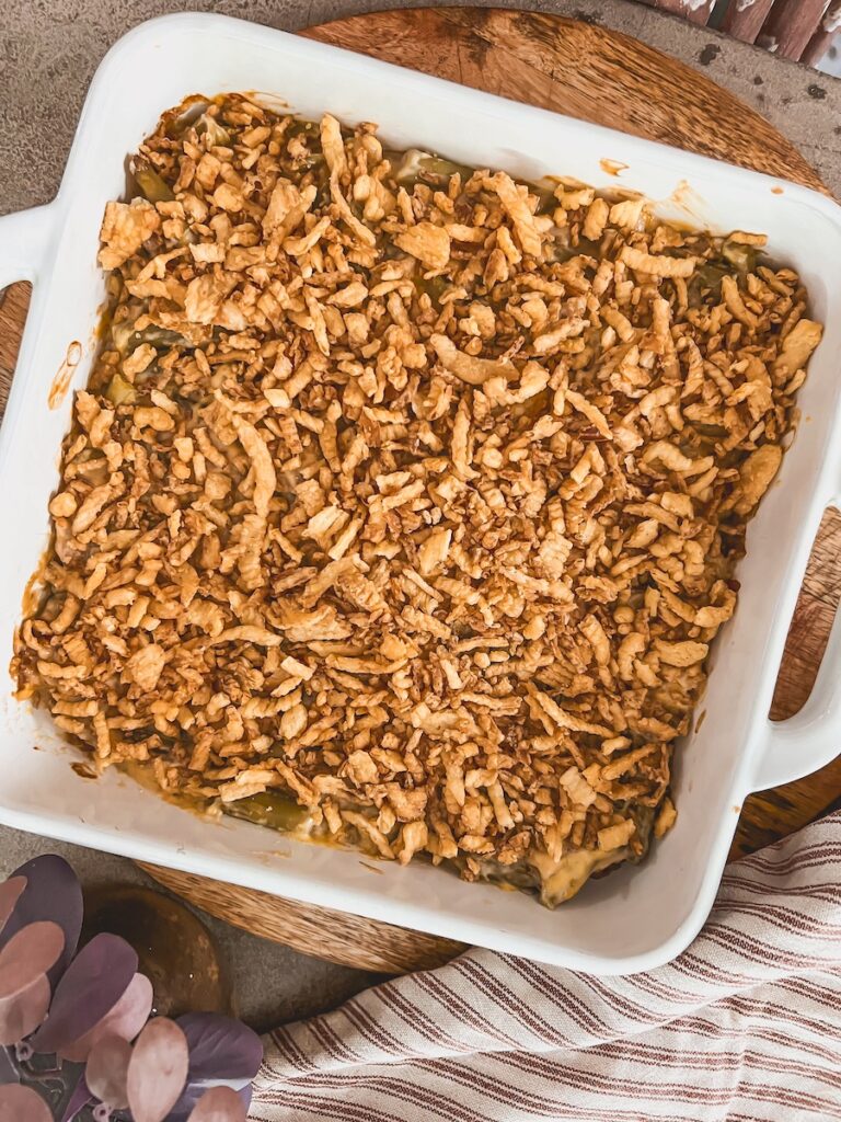 green bean casserole with crispy onions on top