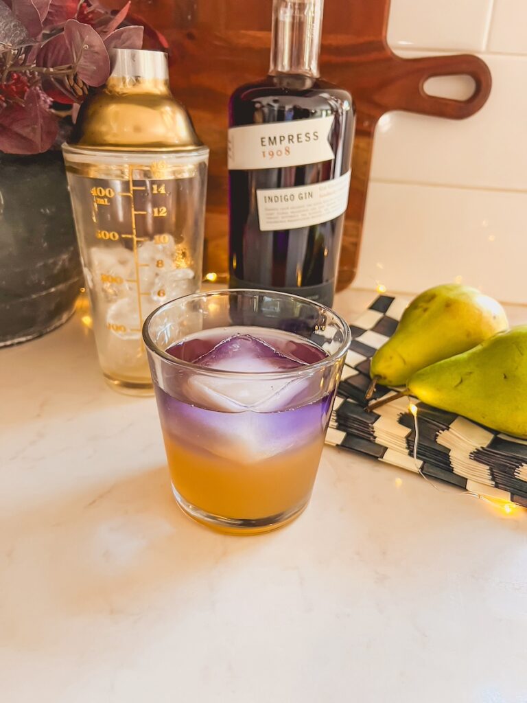 layered fall cocktail with empress gin and pears 