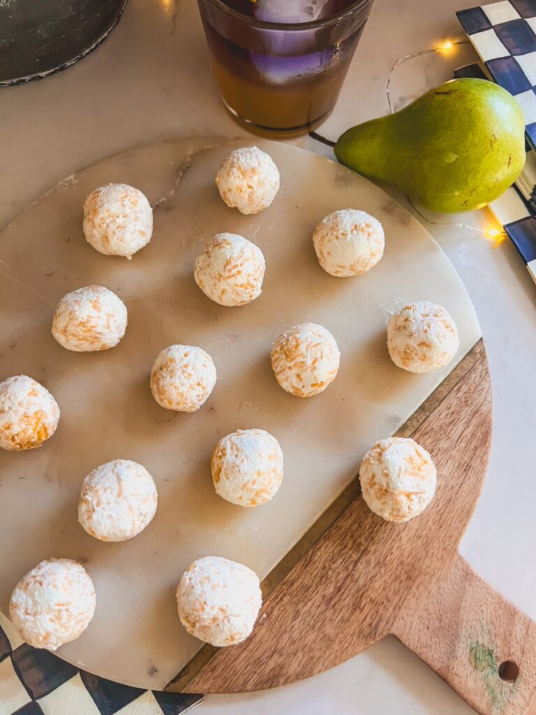 cheeseballs rolled on a platter