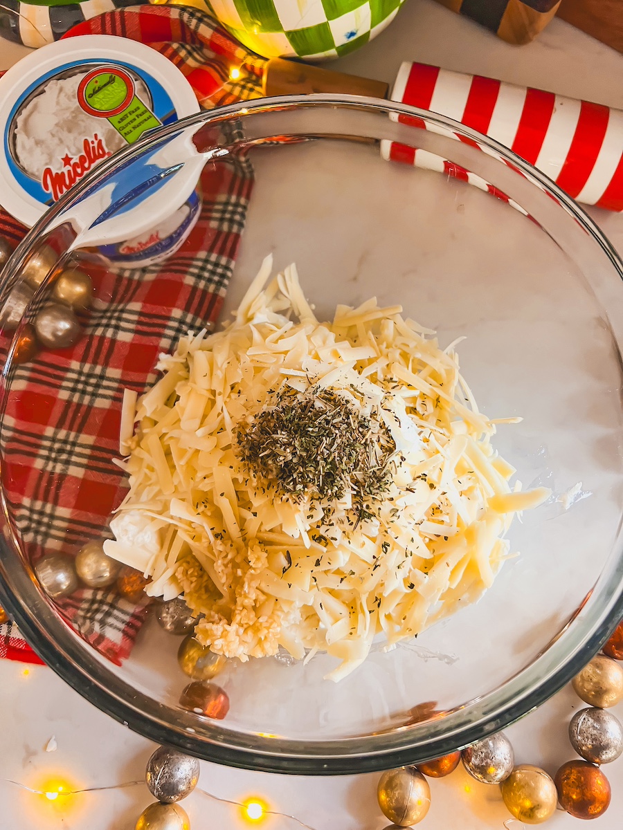 mixed cheese in a glass bowl 