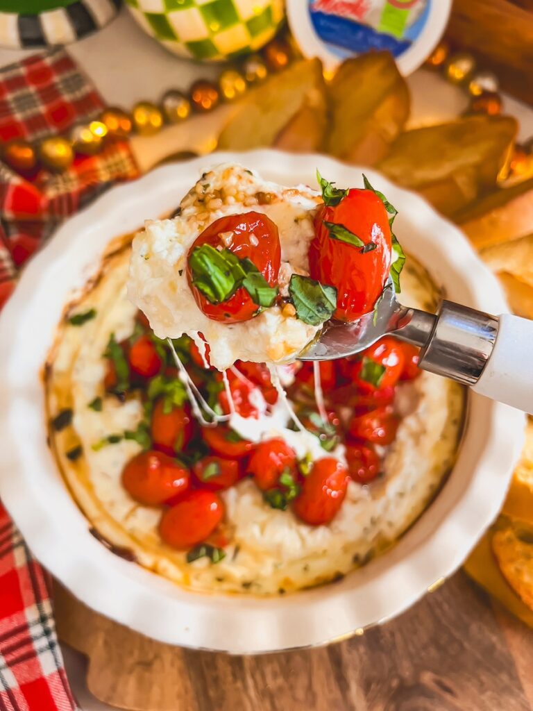 spoon full of baked ricotta dip