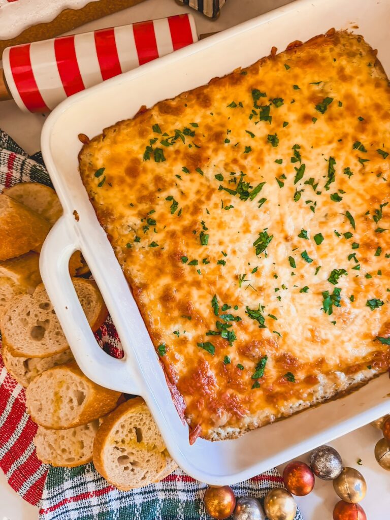 baked cheesy garlic bread dip in baking dish