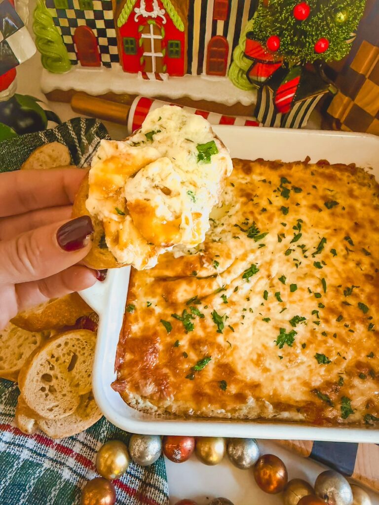 scoop of cheesy garlic bread on a baguette