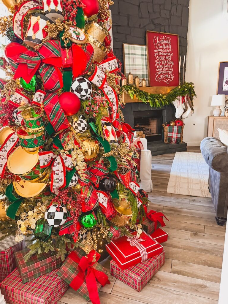 christmas tree decorated with tartan red, gold, drums and nutcrackers