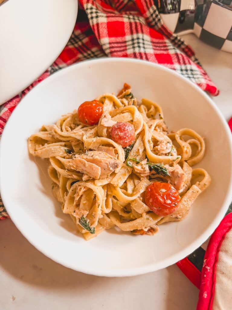 salmon baked pasta in a white bowl