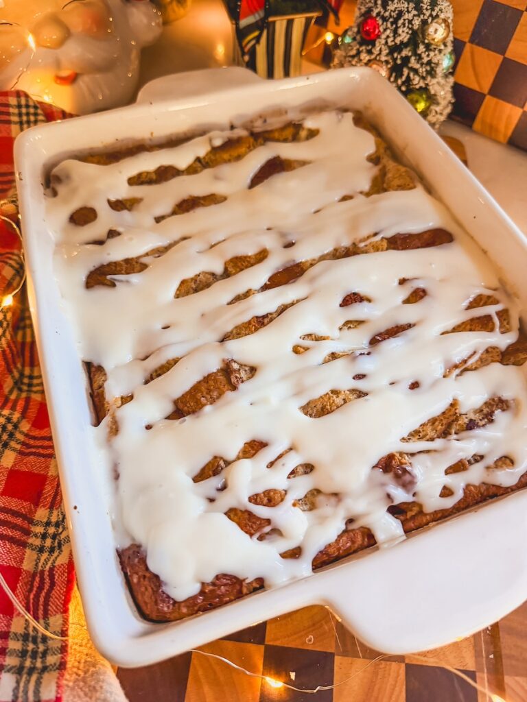 cream cheese glaze over cinnamon roll bread pudding