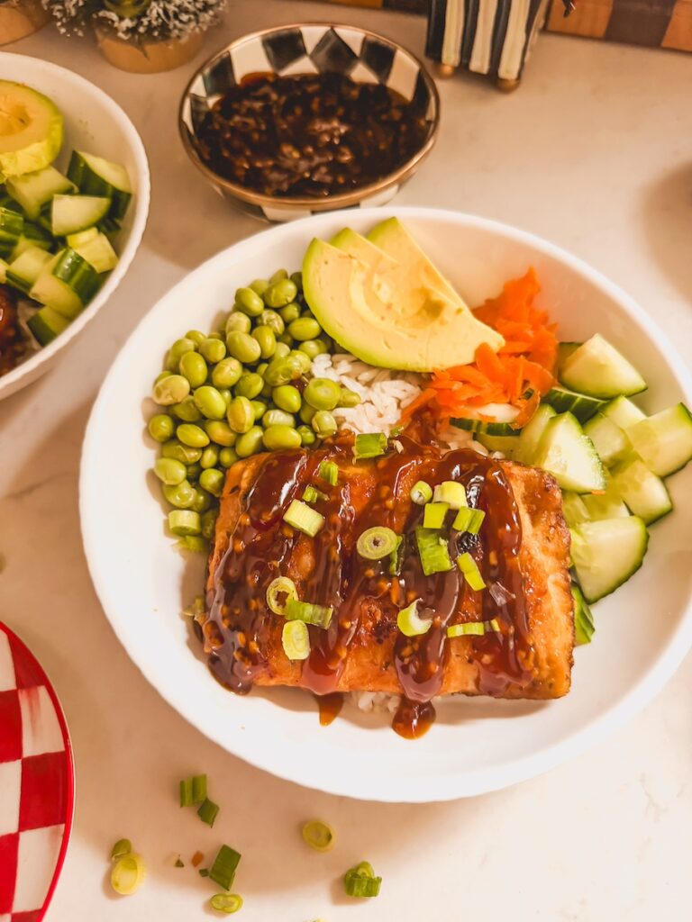 teriyaki salmon bowl in a white bowl ready to be served 