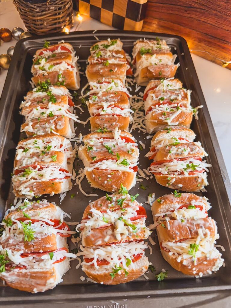 brush rolls with butter mixture on baking sheet