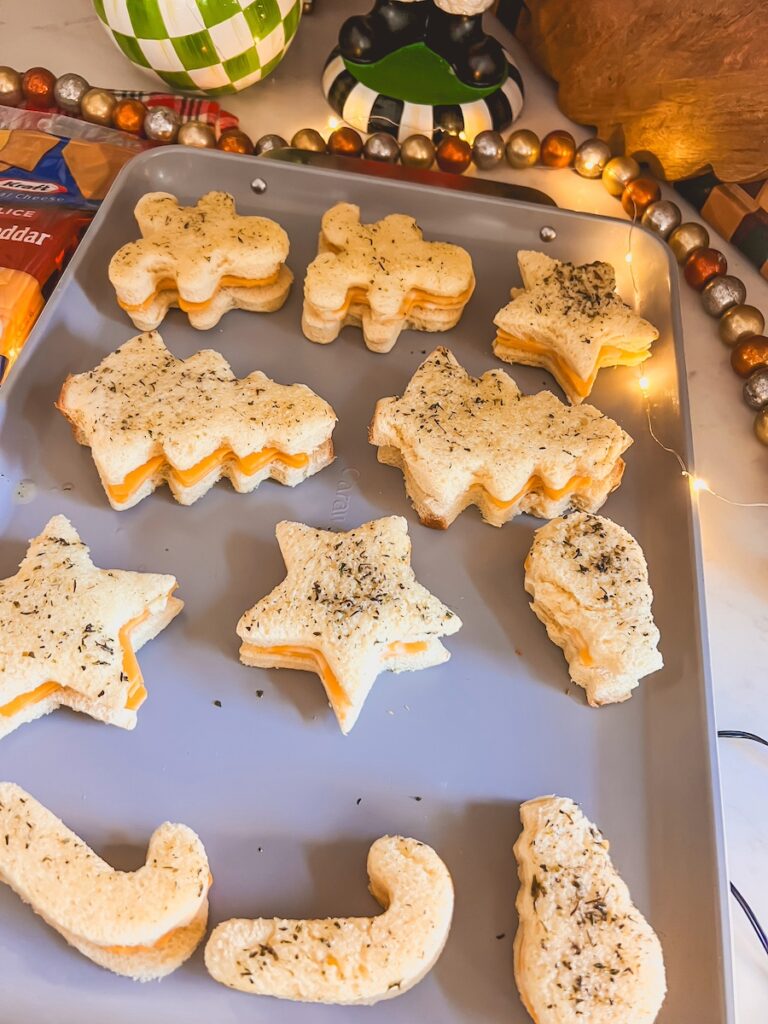grilled cheese on baking sheet in holiday shapes