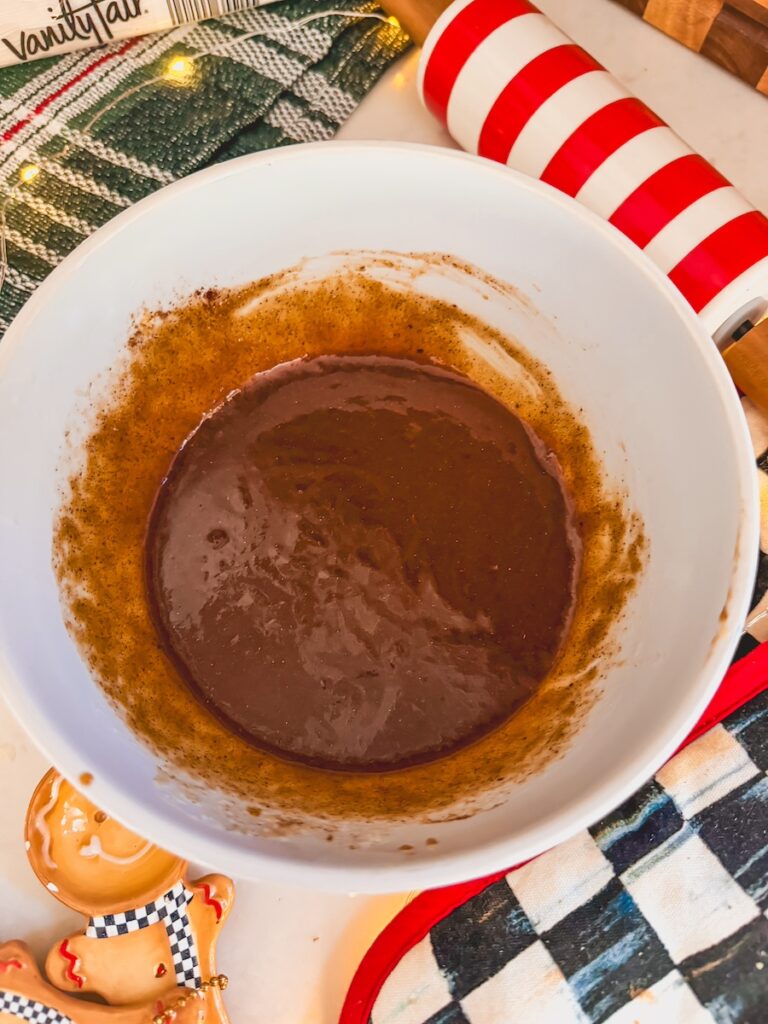 gingerbread spices and mixture in a white bowl