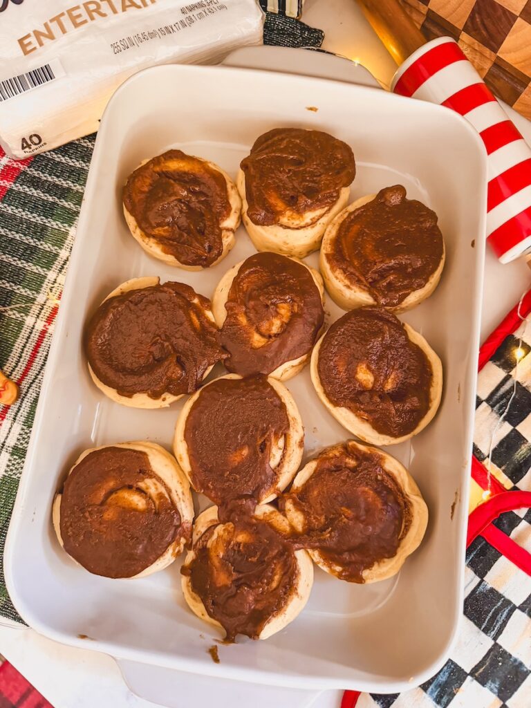 gingerbread mixture spooned on top of each cinnamon roll