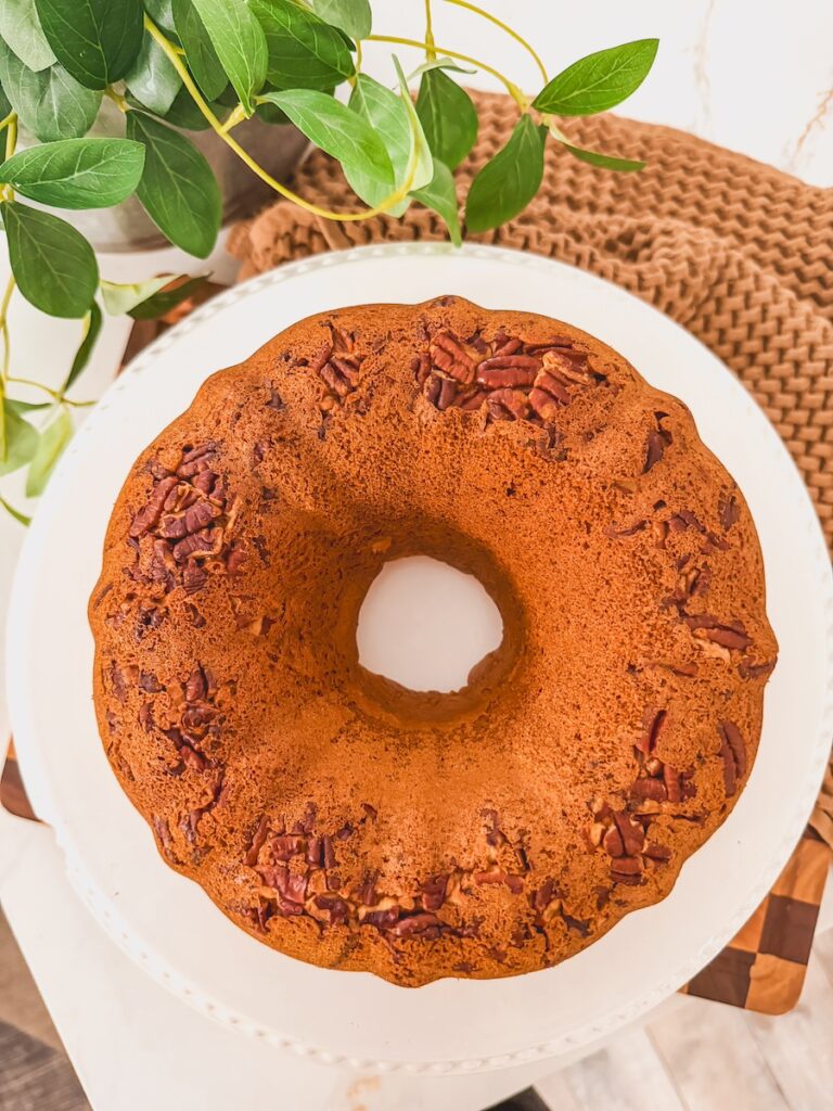 A bundt cake flipped out onto a white plate.
