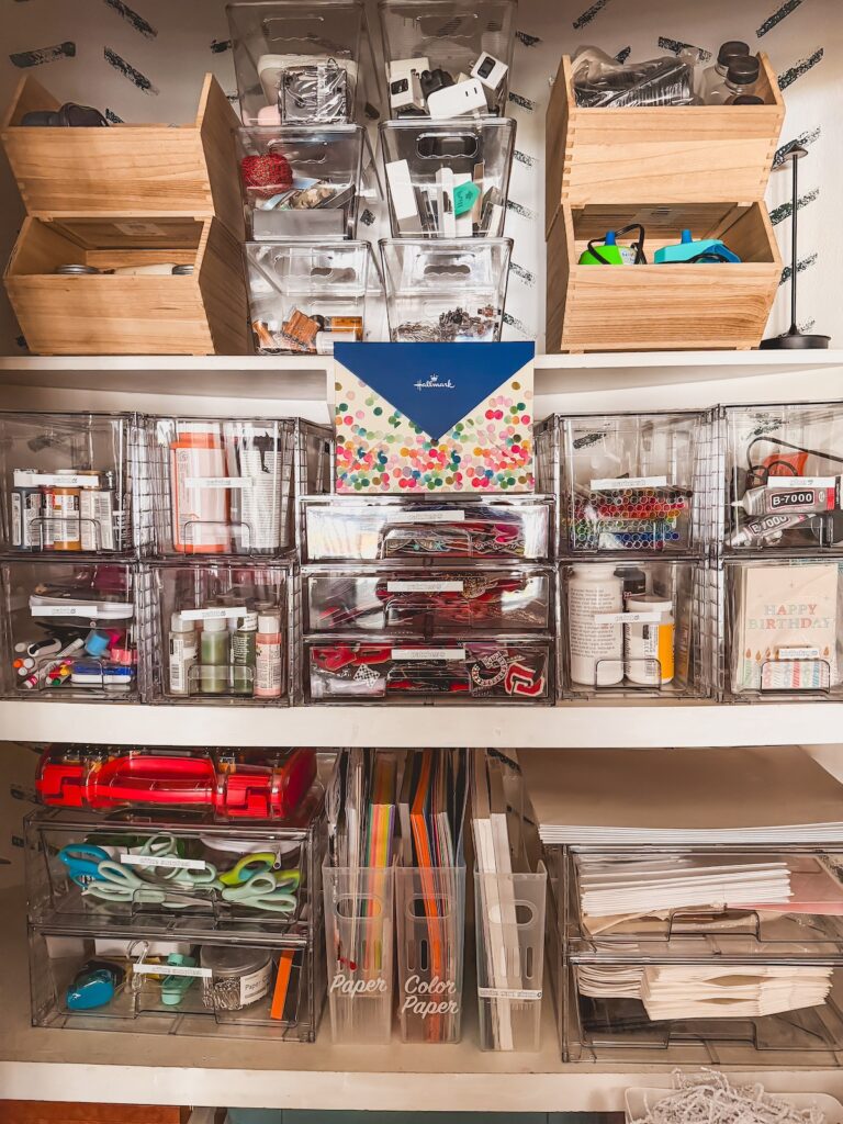 close up of clear bins in office closet