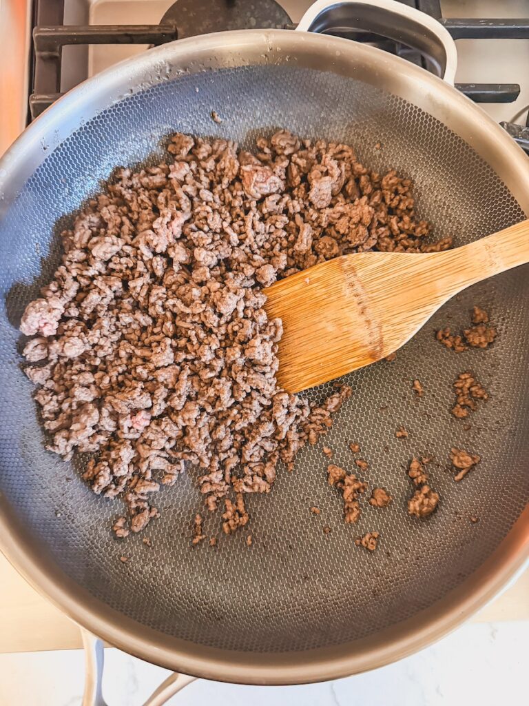 cooked ground beef in skillet