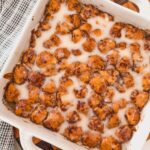 cinnamon roll bites in white baking dish