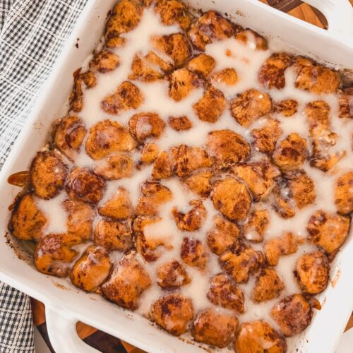cinnamon roll bites in white baking dish