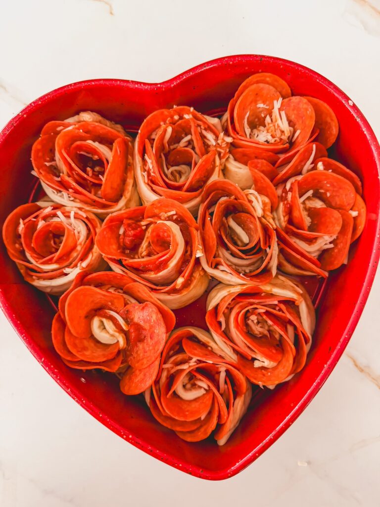 pizza roses placed into heart shaped springform pan