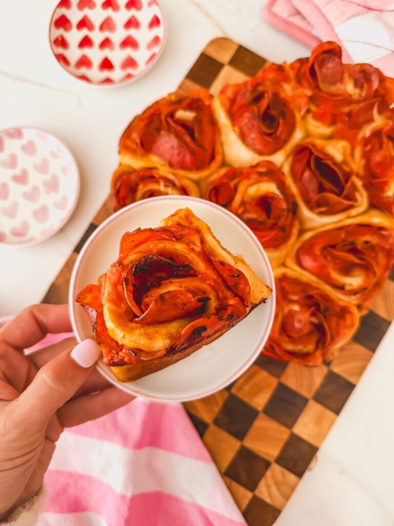 heart pizza rolls on a small plate close up