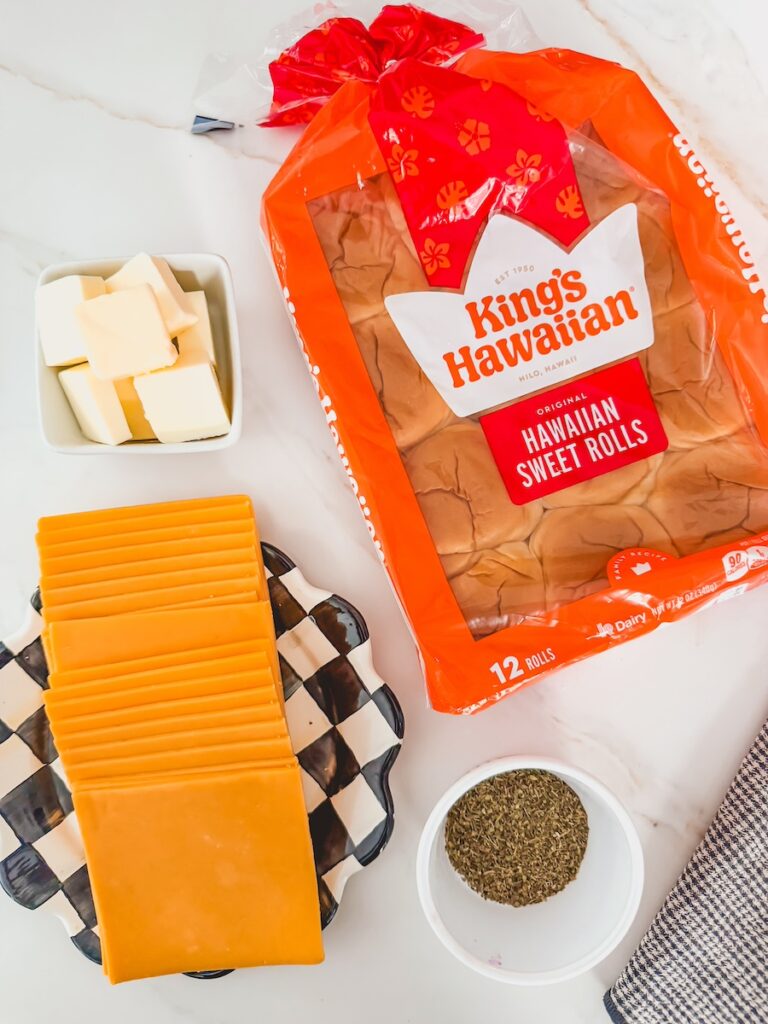 ingredients for kings hawaiian grilled cheese, rolls, cheese, butter, italian seasoning