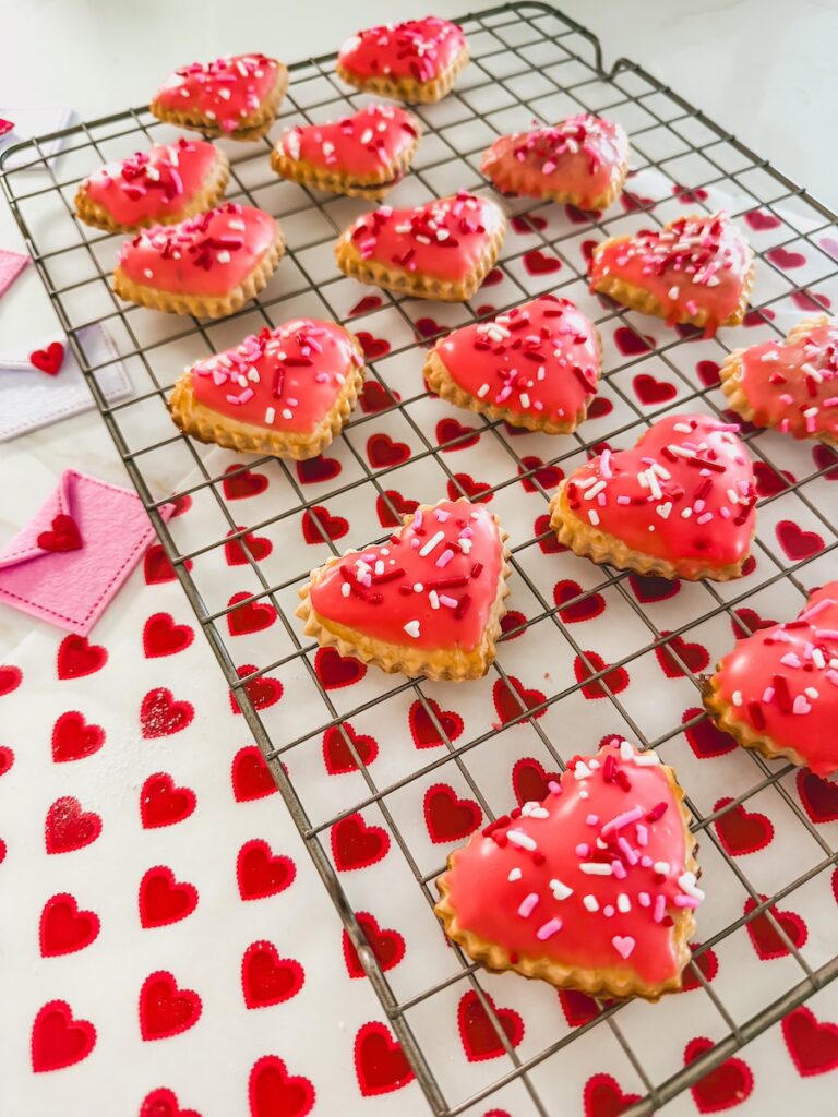 close up of strawberry heart pop tarts for valentines day with sprinkles