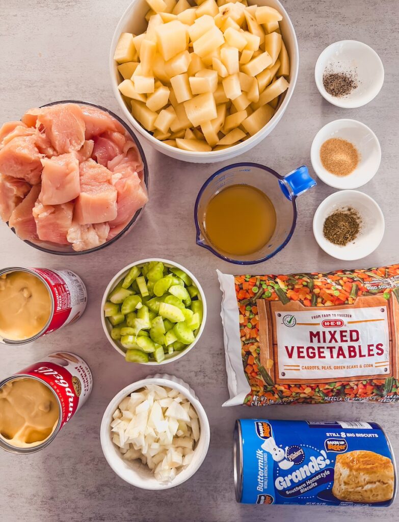slow cooker chicken pot pie ingredients on marble counter