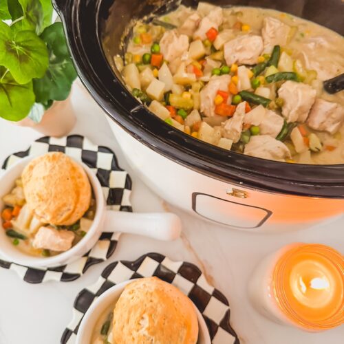 slow cooker chicken pot pie in slow cooker next to two individual servings of chicken pot pie topped with biscuits