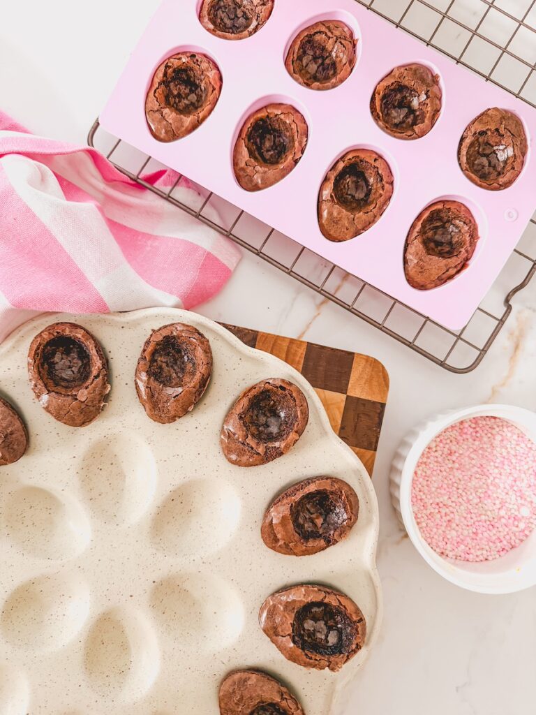 brownies in egg mold next to brownies in egg tray